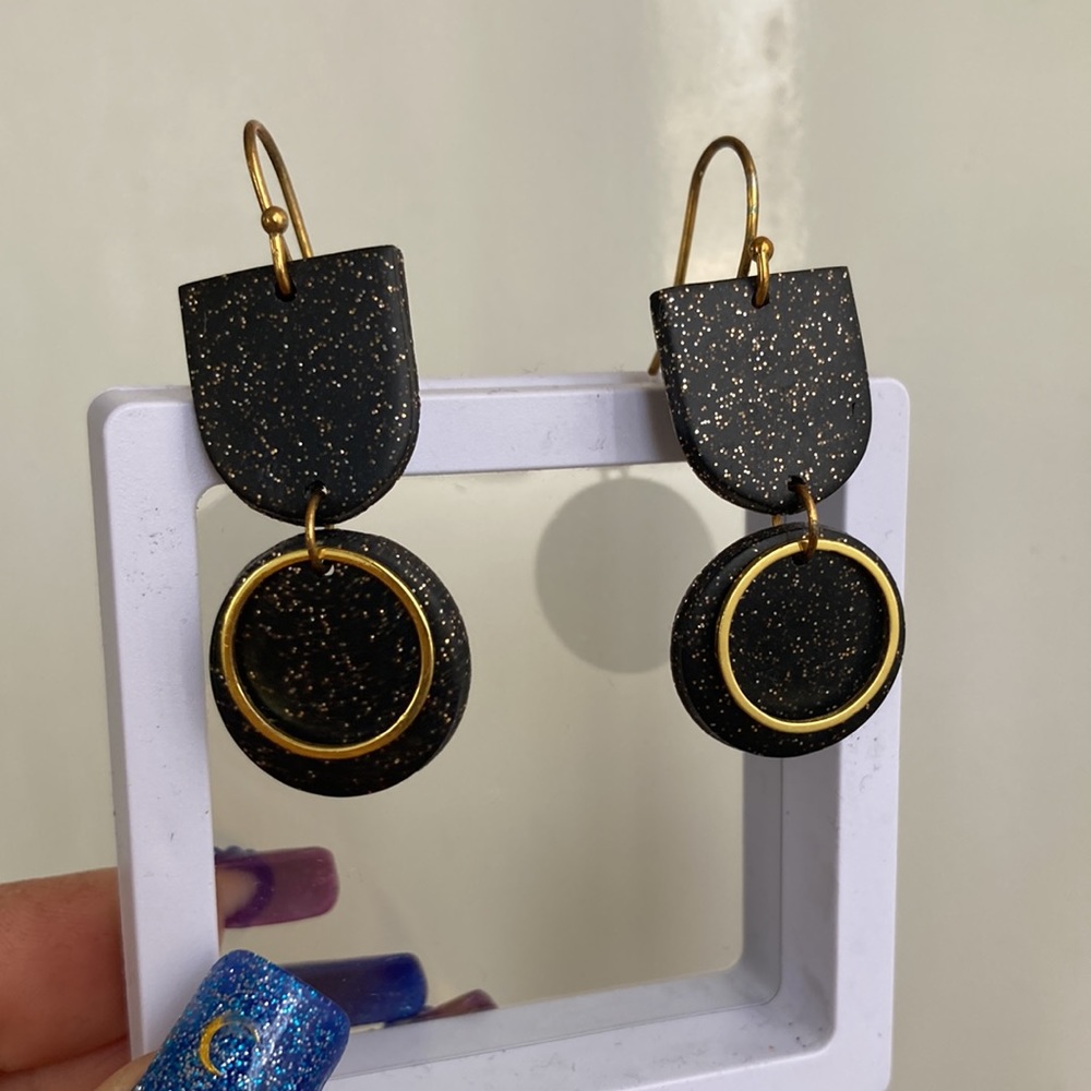 Black and gold sparkly dangle earrings